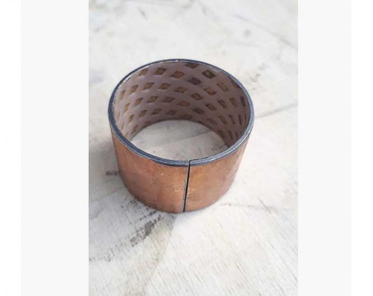 Втулка розтискного кулака з фторопластом Втулка розтискного кулака з фторопластом